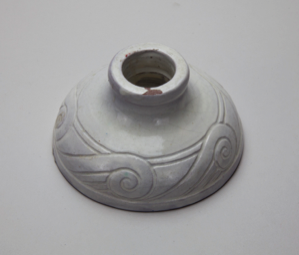 Image of Candlestick with Stylized Wave Design