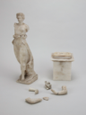 Image of Untitled [Statuette of a woman, walking topless]
