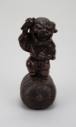 Image of Lion-headed figure standing on a sake cask